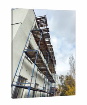 A building with scaffolding on the side