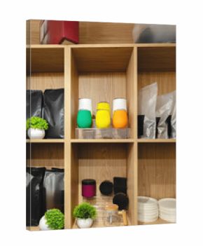 Colorful jars and organized shelves in a modern kitchen storage area
