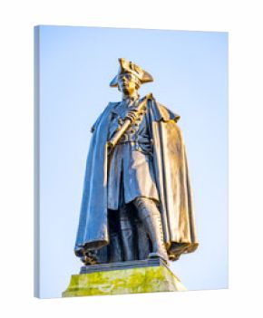 The statue of General James Wolfe stands tall in Greenwich, London, showcasing historical military significance. It captures the general in full uniform, commemorating his legacy.