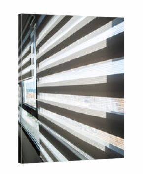 Sunlight passing through zebra blinds in bright modern interior with panoramic view