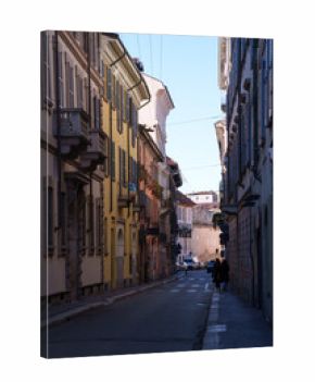 Old buildings along via Lanzone, historic street of Milan, Italy