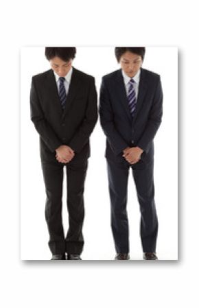 two young businessmen with a bow