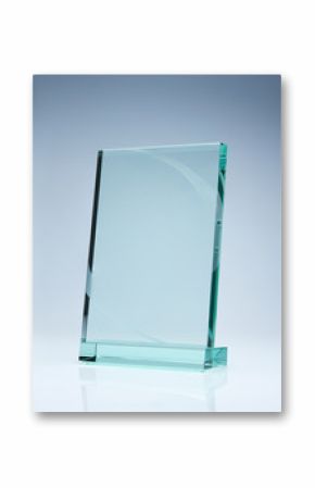 Photo of blank glass award plate with copy space
