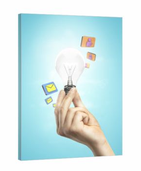 hand holding lighbulb