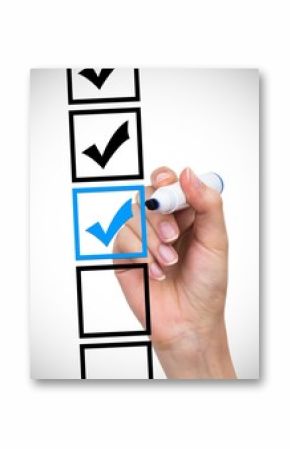 Hand with pen mark the check boxes