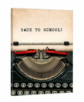 Antique typewriter with aged textured paper sheet Back to school