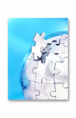 Globe made out of puzzle pieces - global business/global