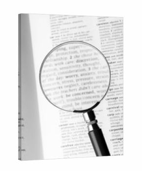 Close Up of Specific Word Care in a Dictionary with Loupe