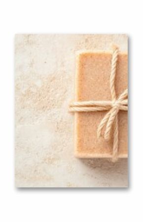 Beige and Pink Glitter Soap Tied with Twine on Neutral Background