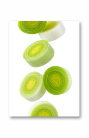 Fresh leek slices falling on transparent background