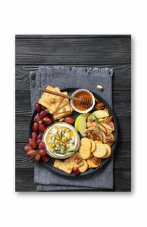 Baked Camembert with honey, pistachios, top view