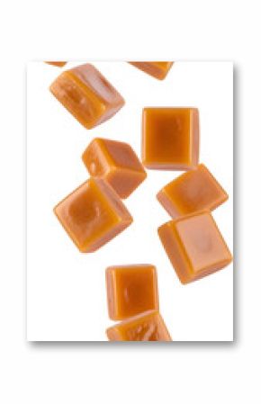 Multiple butterscotch candies falling on transparent background