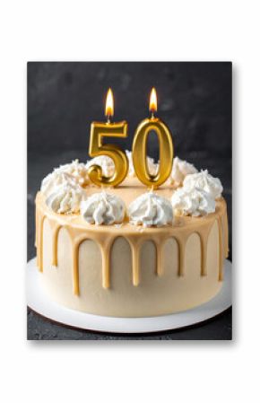 Beautiful cake with beige glaze with burning candle in shape of number 50. Tasty holiday dessert.