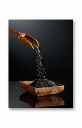 Black sesame on a black reflective background.