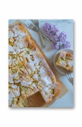 Freshly baked rhubarb crumble cake pieces on plate