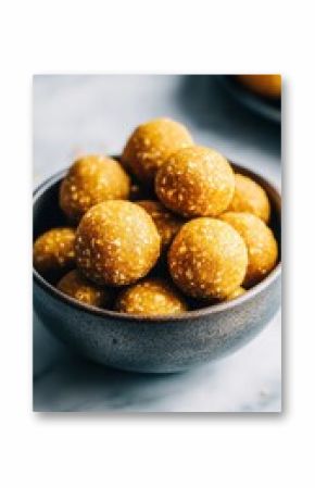 Delicious energy bites in bowl - healthy snack concept for nutrition and fitness