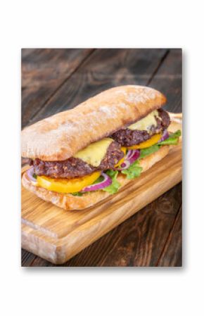 Hearty Ciabatta Sandwich Stacked With Beef Patties, Yellow Tomatoes, And Crisp Lettuce