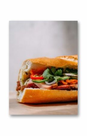 Street-style Vietnamese bánh mì sandwich sliced in half