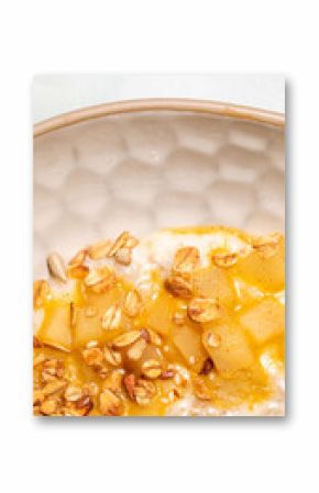 Golden-hued oats tango with candied pear swirls, a breakfast reverie perfect for Hygge mornings and World Porridge Day
