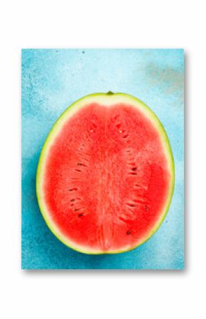 Half of juicy ripe watermelon on a blue stone background. close-up. Free space for text, top view.