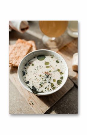 Maine clam chowder, clams, lobster, oysters plated at a restaurant with gorgeous light