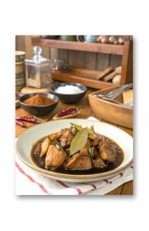 Delicious Filipino Adobo Chicken with Sauce and Bay Leaves