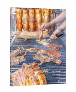 Typical food of Ecuador: guinea pig roasting on the grill, prepared with traditional Andean techniques that preserve cultural essence and offer a unique gastronomic experience.