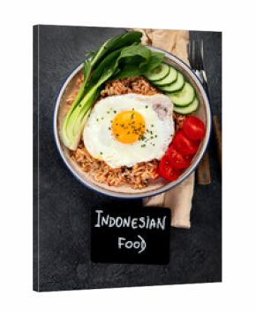 ndonesian nasi goreng (fried rice) served on a plate.