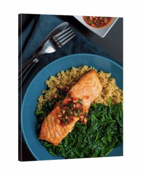 Grilled Salmon Fillet Served with Quinoa and Spinach. Top View Shot Above.