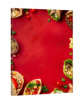 Variety of shawarma wraps with sauces and fresh toppings on a textured red surface, top-down layout. Restaurant flyers, digital menus, marketing banners.