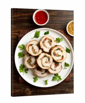 Sliced diet pork roll stuffed with mushroooms, red bell pepper, spinach