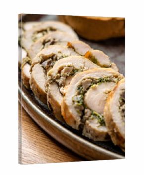 Sliced chicken roulade with mushrooms