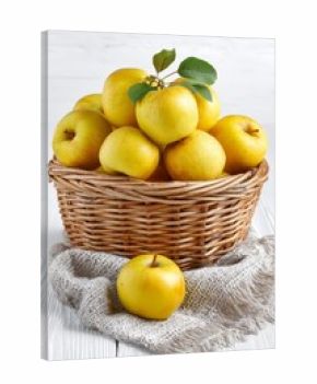 Basket of fresh yellow apples offering healthy food, vertical