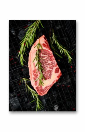 Raw aged Ribeye steak is cooked over hot coals. Marble steak. Barbecue. Top view.