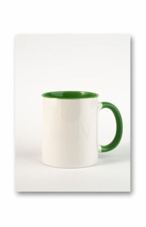 Two-tone 11oz mug on isolated background. Mug with green handle and inner part.
