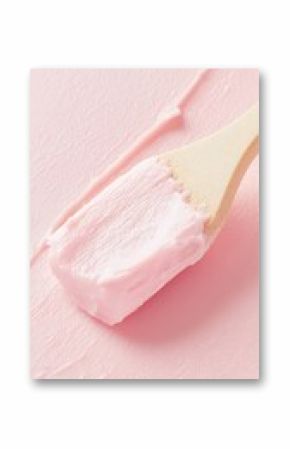 Close-up of Pink Ice Cream on Wooden Spoon