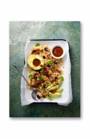 Warm quinoa salad with avocado and meat