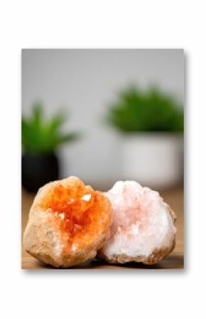 Orange And Pink Geode Crystals Split Open On Wooden Table