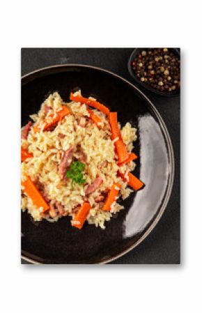 Rice meat and vegetables pilaf fresh delicious gourmet food background on the table rustic food top view copy space