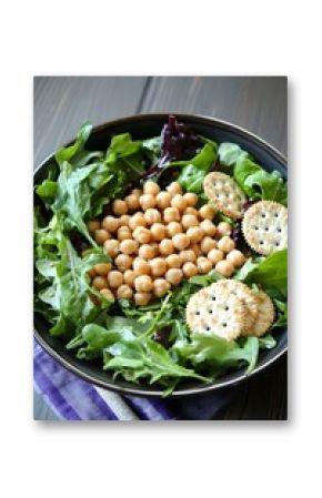 Chickpea salad with mixed greens and crackers