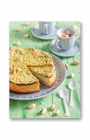 Sweet pistachio cheesecake served with bue coffee.