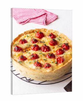 Quiche with cheese, tomatoes, and thyme. Pie. Pastries. Vegetarian food.