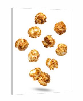 isolated pieces of crunchy caramel glazed popcorn dynamically falling and floating in mid-air against a clean, contrasting transparent background
