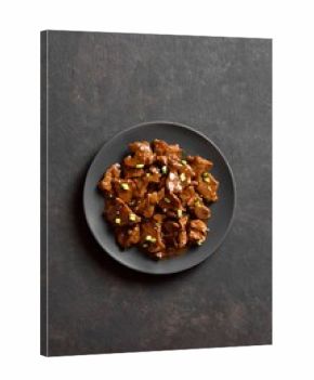 Asian style beef with soy sauce, green onion and sesame seeds