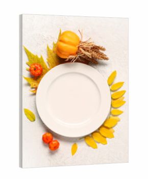 Stylish autumn table setting with pumpkins and leaves on white background