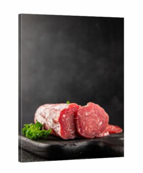 Dry sausage slice pork less fat jamon cured meat natural product tasty snack fresh delicious gourmet food background on the table rustic top view copy space