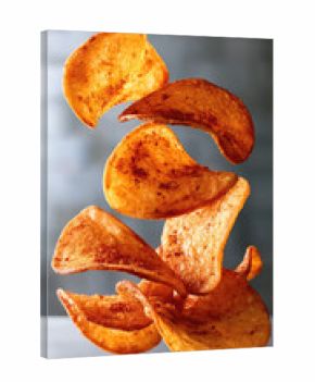 Spicy potato chips with chili seasoning floating in air, crispy texture, golden color, snack food, appetizing and dynamic