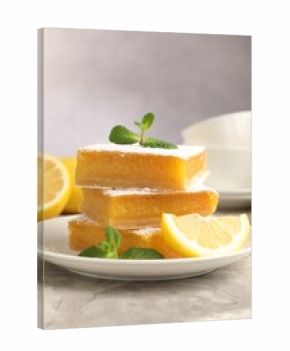 Tasty lemon bars with mint and fresh fruits on grey marble table, closeup