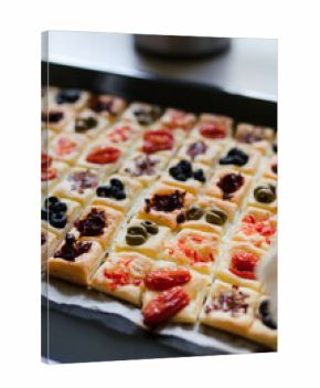 Catering banquet table at reception. Restaurant presentation, european cuisine, food consumption, party concept. Food styling, appetizers bar, welcome drink, event design.