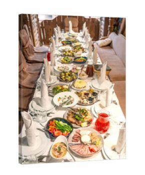 Festive banquet table with traditional dishes
